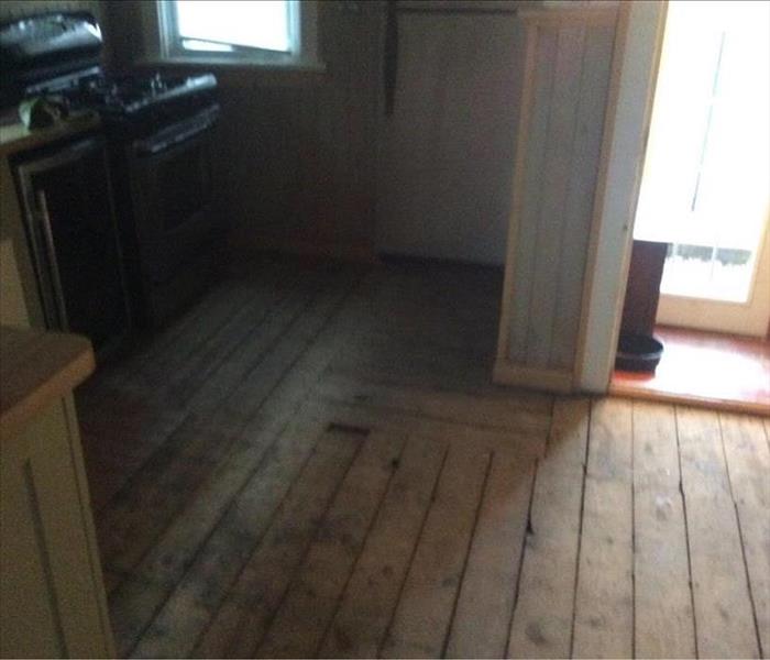 SERVPRO was able to remove wood floor and dry out the kitchen subfloor